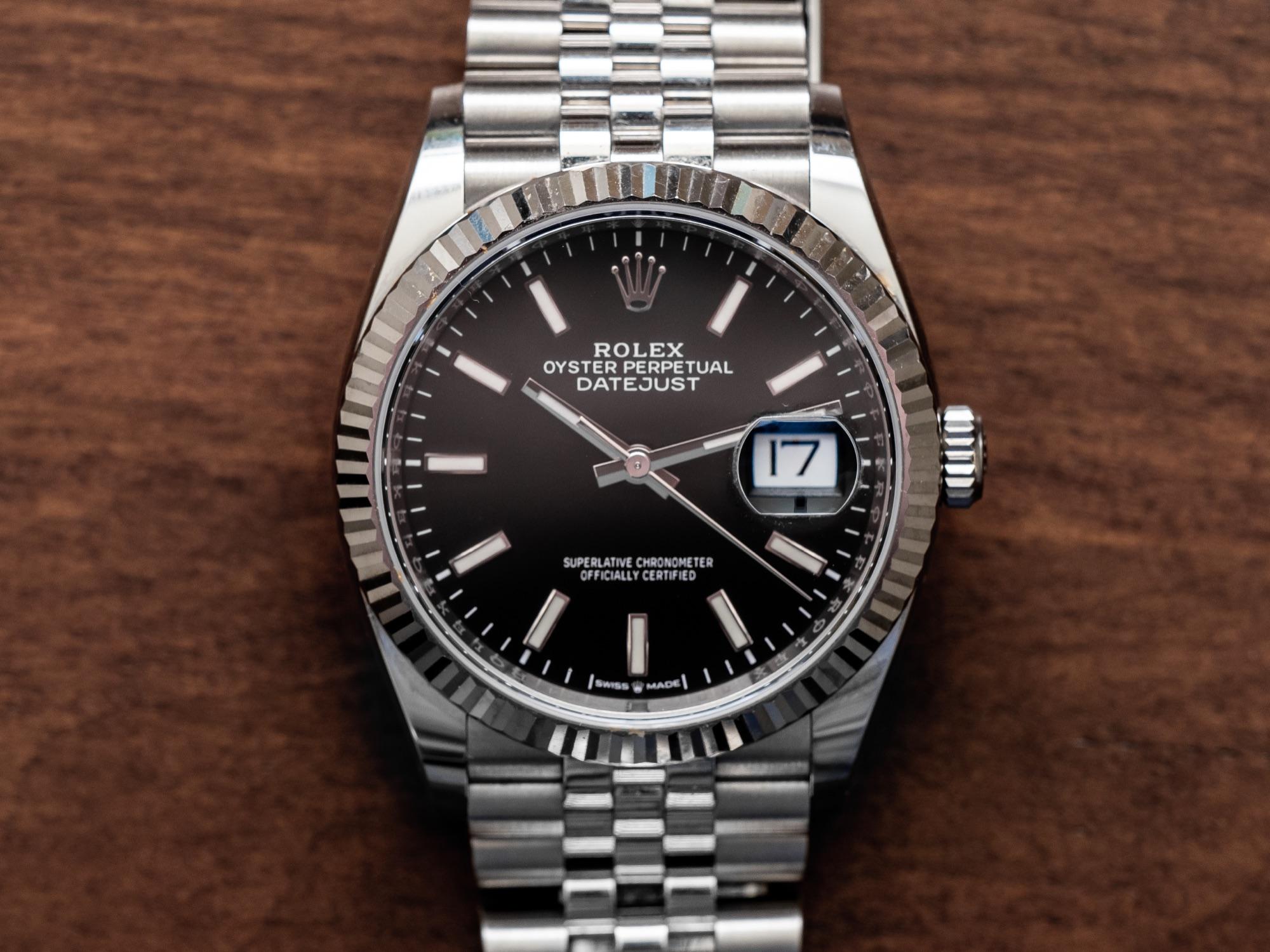 Rolex Datejust with black dial and Jubilee bracelet